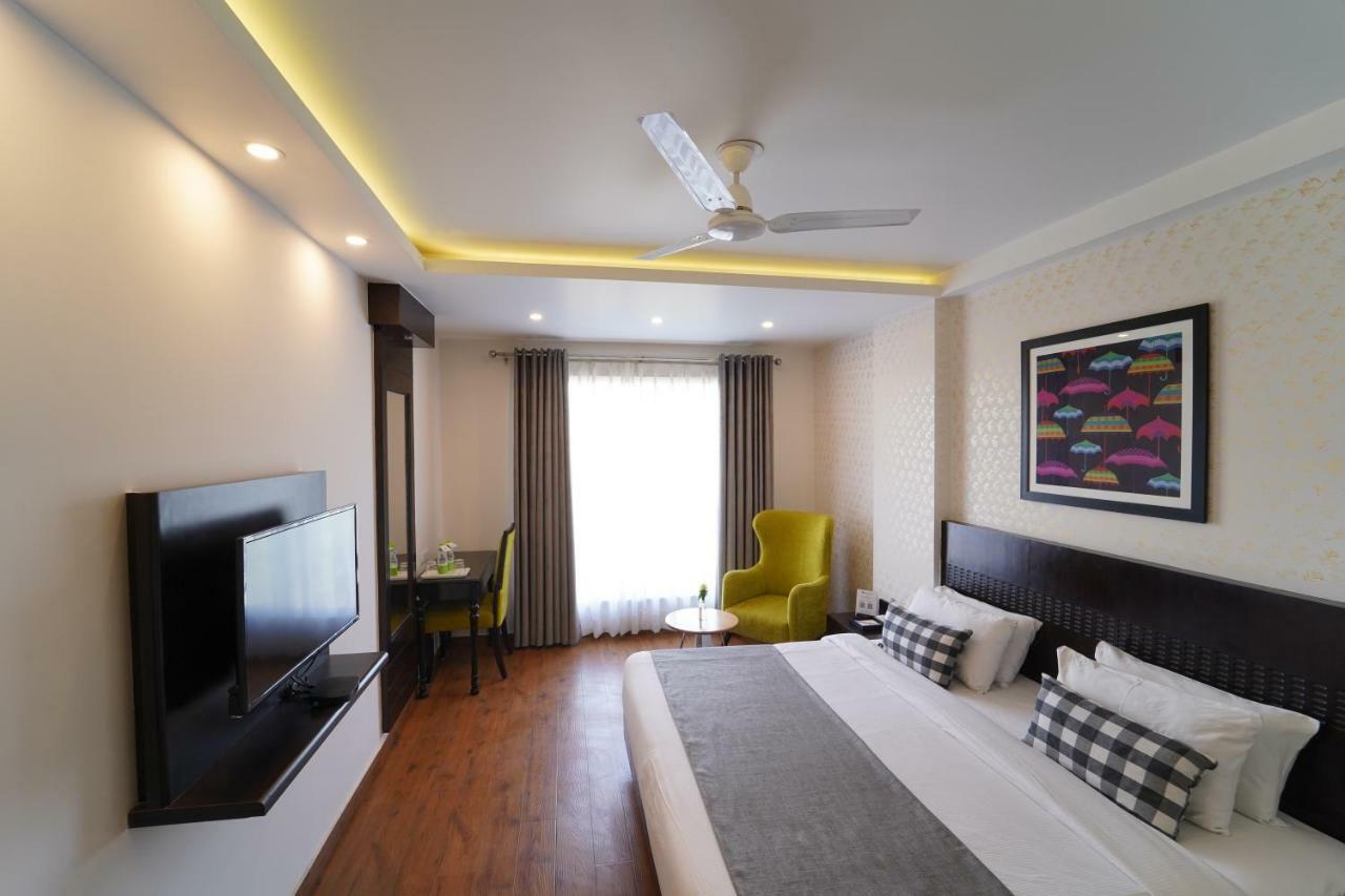 Rockland Hotel, C.R Park New Delhi Buitenkant foto
