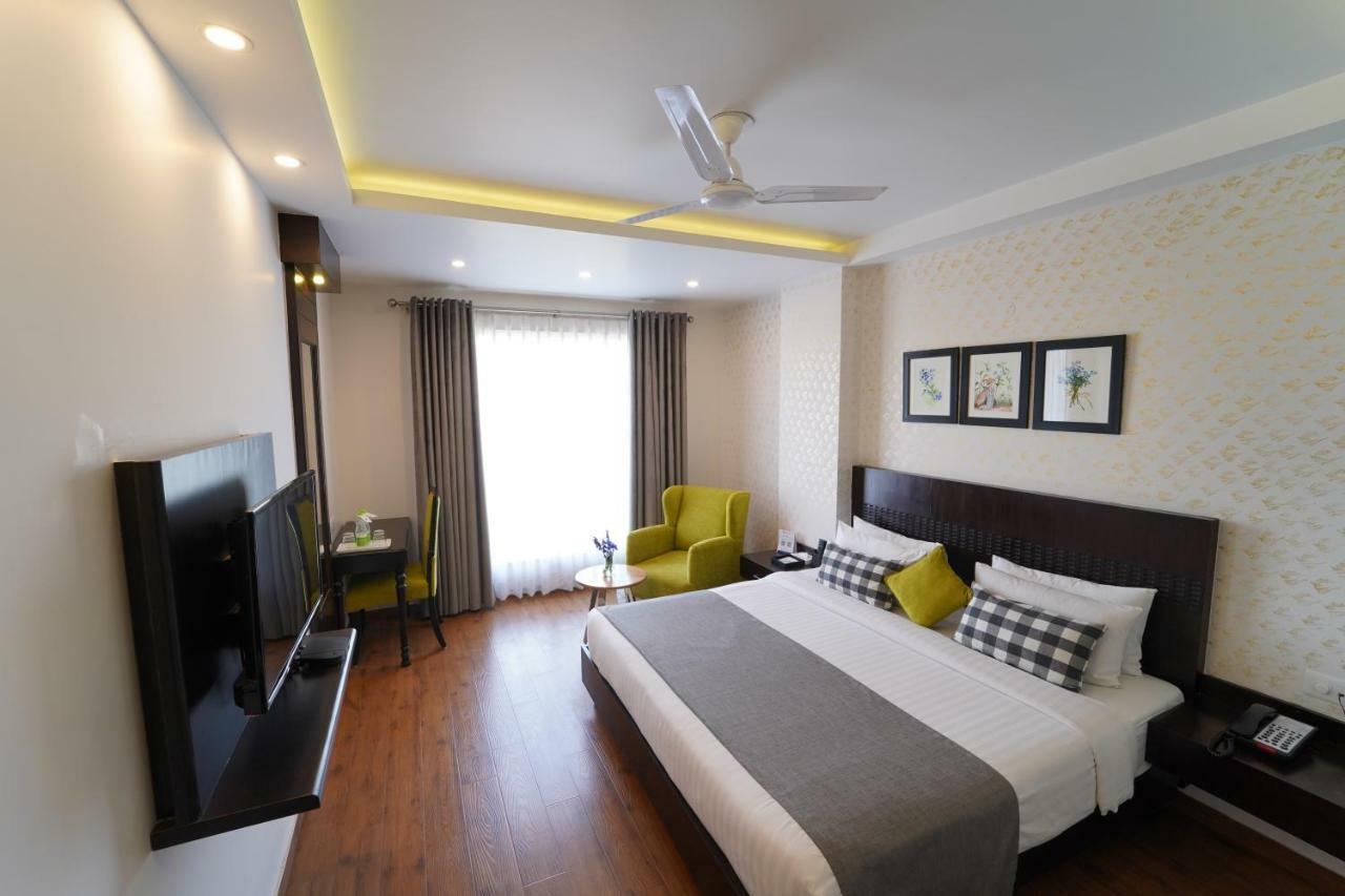 Rockland Hotel, C.R Park New Delhi Buitenkant foto